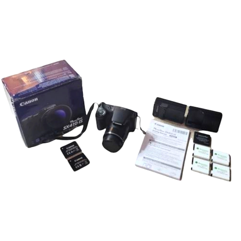 Canon SX410 IS camera,2 chargers and 7 batteries